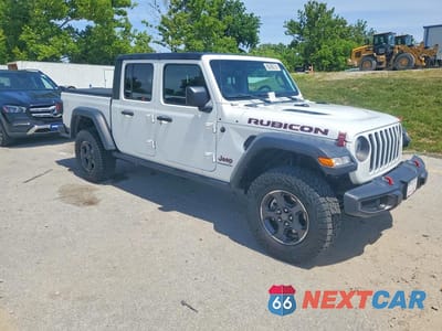 Czwarte zdjęcie samochodu z boku: 2023 JEEP GLADIATOR RUBICON VIN:1C6JJTBG5PL530526 - miniatura