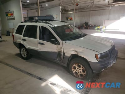Czwarte zdjęcie samochodu z boku: 2001 JEEP GRAND CHEROKEE LAREDO VIN:1J4GW48S21C686417 - miniatura