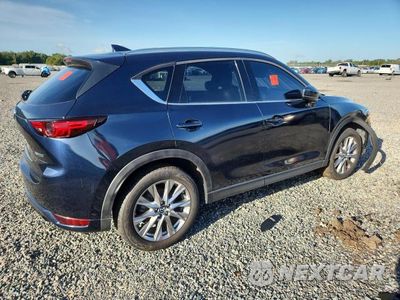 Trzecie zdjęcie samochodu z tyłu: 2021 MAZDA CX-5 GRAND TOURING VIN:JM3KFBDM1M1442597 - miniatura