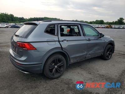 Trzecie zdjęcie samochodu z tyłu: 2019 VOLKSWAGEN TIGUAN SE VIN:3VV2B7AX9KM186064 - miniatura
