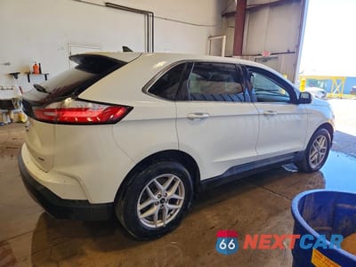 Trzecie zdjęcie samochodu z tyłu: 2024 FORD EDGE SEL VIN:2FMPK4J9XRBA96384 - miniatura
