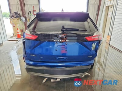 Zdjęcie 6 z 12 samochodu: 2022 FORD EDGE SEL VIN:2FMPK4J93NBA20094 - miniatura
