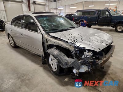 Czwarte zdjęcie samochodu z boku: 2003 NISSAN ALTIMA 2.5 VIN:1N4AL11D03C248972 - miniatura
