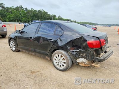 Trzecie zdjęcie samochodu z tyłu: 2012 VOLKSWAGEN JETTA VIN:3VWDX7AJ2CM340133 - miniatura