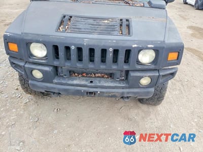 Zdjęcie 12 z 13 samochodu: 2003 HUMMER H2 VIN:5GRGN23U53H138681 - miniatura