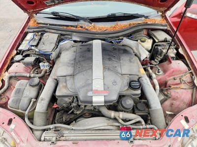 Zdjęcie 11 z 12 samochodu: 2001 MERCEDES-BENZ SLK 320 VIN:WDBKK65F21F205352 - miniatura