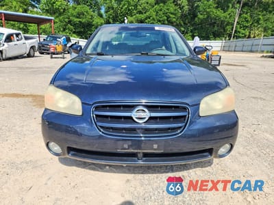 Piąte zdjęcie samochodu w środku: 2002 NISSAN MAXIMA GXE VIN:JN1DA31D02T452844 - miniatura