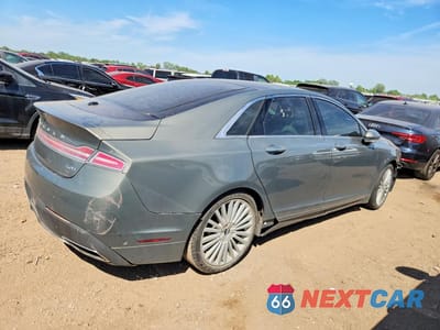 Trzecie zdjęcie samochodu z tyłu: 2017 LINCOLN MKZ HYBRID RESERVE VIN:3LN6L5MU2HR635059 - miniatura