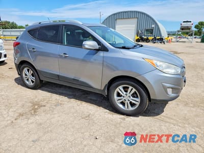 Czwarte zdjęcie samochodu z boku: 2013 HYUNDAI TUCSON GLS VIN:KM8JU3AC5DU739250 - miniatura