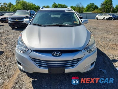 Piąte zdjęcie samochodu w środku: 2011 HYUNDAI TUCSON GLS VIN:KM8JUCAC4BU300151 - miniatura
