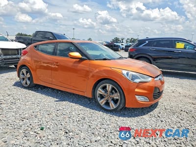Czwarte zdjęcie samochodu z boku: 2012 HYUNDAI VELOSTER BASE VIN:KMHTC6AD9CU056424 - miniatura