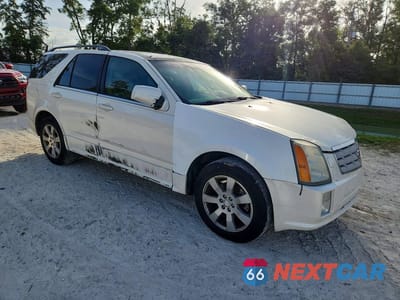 Czwarte zdjęcie samochodu z boku: 2006 CADILLAC SRX VIN:1GYEE637360196408 - miniatura