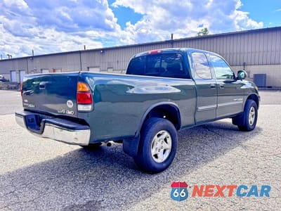 Czwarte zdjęcie samochodu z boku: 2003 TOYOTA TUNDRA ACCESS CAB SR5 VIN:5TBBT44163S430930 - miniatura