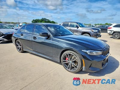 Czwarte zdjęcie samochodu z boku: 2023 BMW 330I VIN:3MW69FF08P8D45557 - miniatura