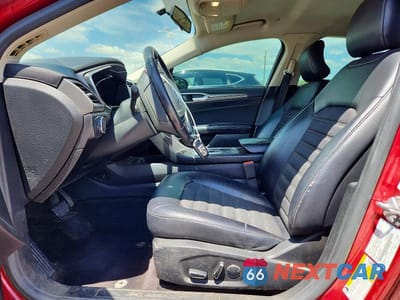 Zdjęcie 7 z 13 samochodu: 2017 FORD FUSION SE HYBRID VIN:3FA6P0LU3HR278400 - miniatura