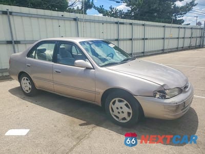 Czwarte zdjęcie samochodu z boku: 1999 TOYOTA COROLLA VE VIN:2T1BR12E0XC202110 - miniatura