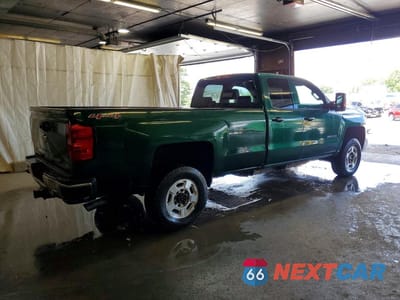 Trzecie zdjęcie samochodu z tyłu: 2016 CHEVROLET SILVERADO K2500 HEAVY DUTY LT VIN:1GC2KVEG1GZ244607 - miniatura