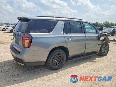 Trzecie zdjęcie samochodu z tyłu: 2024 CHEVROLET TAHOE K1500 Z71 VIN:1GNSKPKLXRR249716 - miniatura