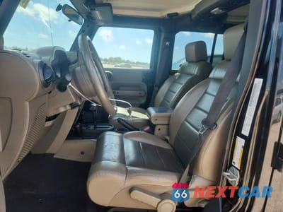 Zdjęcie 7 z 13 samochodu: 2010 JEEP WRANGLER UNLIMITED RUBICON VIN:1J4HA6H12AL187929 - miniatura