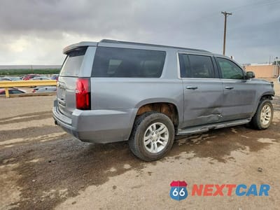 Trzecie zdjęcie samochodu z tyłu: 2020 CHEVROLET SUBURBAN C1500 LT VIN:1GNSCHKC6LR301644 - miniatura