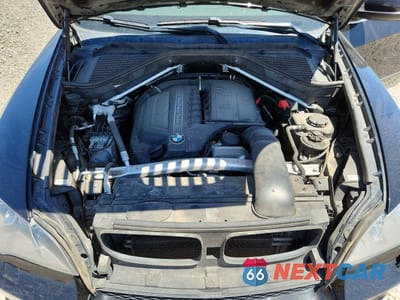 Zdjęcie 12 z 13 samochodu: 2013 BMW X5 XDRIVE35I VIN:5UXZV4C53D0E04005 - miniatura