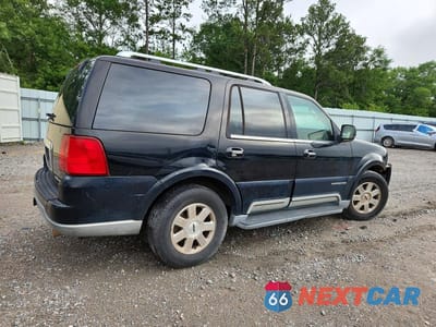 Trzecie zdjęcie samochodu z tyłu: 2003 LINCOLN NAVIGATOR VIN:5LMFU27R23LJ43946 - miniatura