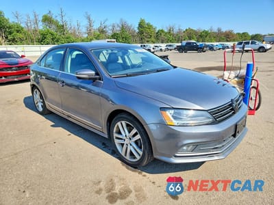 Czwarte zdjęcie samochodu z boku: 2017 VOLKSWAGEN JETTA SEL VIN:3VWL17AJ0HM405338 - miniatura