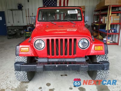 Piąte zdjęcie samochodu w środku: 2000 JEEP WRANGLER / TJ SE VIN:1J4FA29P6YP735131 - miniatura