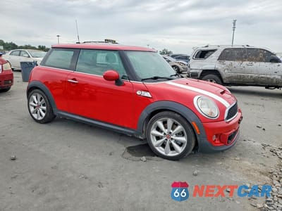Czwarte zdjęcie samochodu z boku: 2011 MINI COOPER S VIN:WMWSV3C55BTY11813 - miniatura