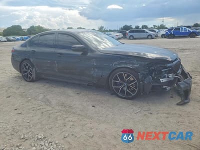Czwarte zdjęcie samochodu z boku: 2022 BMW 540 XI VIN:WBA73BJ0XNCK28929 - miniatura