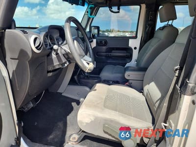 Zdjęcie 7 z 12 samochodu: 2008 JEEP WRANGLER SAHARA VIN:1J4FA54108L643749 - miniatura