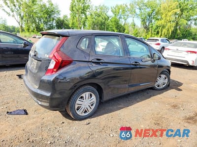 Trzecie zdjęcie samochodu z tyłu: 2019 HONDA FIT LX VIN:3HGGK5H48KM737199 - miniatura