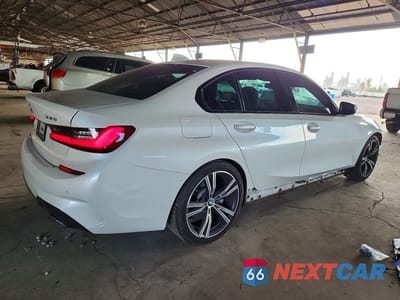 Trzecie zdjęcie samochodu z tyłu: 2021 BMW 330I VIN:3MW5R1J08M8C02593 - miniatura