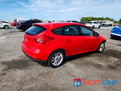 Trzecie zdjęcie samochodu z tyłu: 2016 FORD FOCUS SE VIN:1FADP3K23GL276698 - miniatura