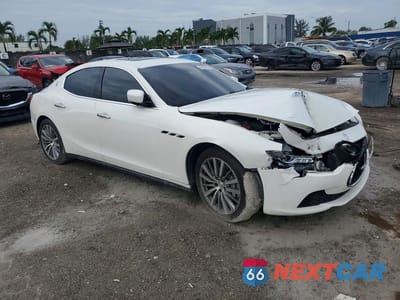 Czwarte zdjęcie samochodu z boku: 2014 MASERATI GHIBLI VIN:ZAM57XSA2E1103580 - miniatura