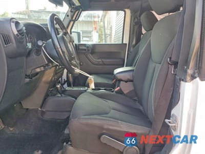 Zdjęcie 7 z 12 samochodu: 2016 JEEP WRANGLER SPORT VIN:1C4AJWAG8GL167506 - miniatura