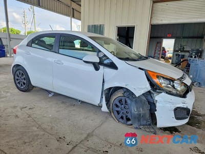 Czwarte zdjęcie samochodu z boku: 2013 KIA RIO LX VIN:KNADM5A36D6236020 - miniatura