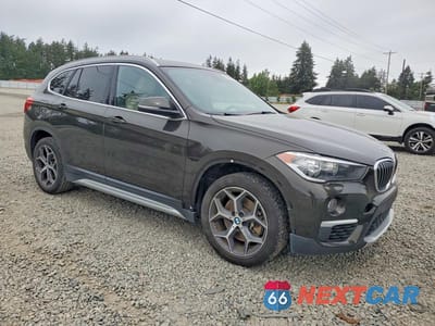 Czwarte zdjęcie samochodu z boku: 2018 BMW X1 SDRIVE28I VIN:WBXHU7C33J3H43750 - miniatura