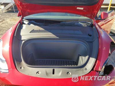 Zdjęcie 12 z 14 samochodu: 2023 TESLA MODEL Y VIN:7SAYGDEE8PF928230 - miniatura