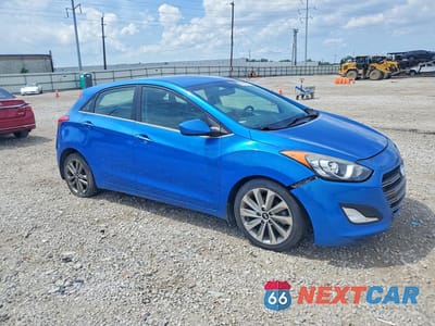 Czwarte zdjęcie samochodu z boku: 2017 HYUNDAI ELANTRA GT BASE VIN:KMHD35LH5HU355138 - miniatura