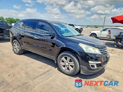 Czwarte zdjęcie samochodu z boku: 2016 CHEVROLET TRAVERSE LT VIN:1GNKRHKD8GJ270246 - miniatura