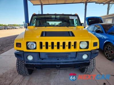 Piąte zdjęcie samochodu w środku: 2003 HUMMER H2 VIN:5GRGN23U03H132738 - miniatura