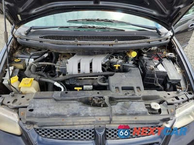 Zdjęcie 12 z 13 samochodu: 2000 DODGE GRAND CARAVAN SE VIN:1B4GP44G9YB770171 - miniatura