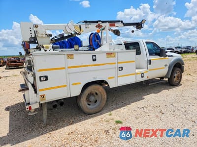 Trzecie zdjęcie samochodu z tyłu: 2015 FORD F550 SUPER DUTY VIN:1FDUF5GT6FED59020 - miniatura