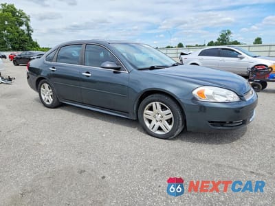 Czwarte zdjęcie samochodu z boku: 2013 CHEVROLET IMPALA LT VIN:2G1WG5E3XD1172559 - miniatura