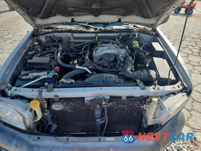 Zdjęcie 12 z 13 samochodu: 2000 NISSAN PATHFINDER XE VIN:JN8AR07S4YW429110 - miniatura