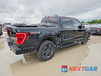 Trzecie zdjęcie samochodu z tyłu: 2023 FORD F150 SUPERCREW VIN:1FTFW1E5XPKD65710 - miniatura