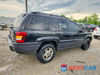 Trzecie zdjęcie samochodu z tyłu: 2003 JEEP GRAND CHEROKEE LAREDO VIN:1J4GW48S83C608856 - miniatura