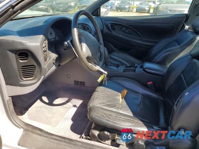 Zdjęcie 7 z 12 samochodu: 1999 MITSUBISHI ECLIPSE GS VIN:4A3AK44Y4XE056507 - miniatura