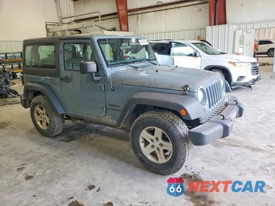 Czwarte zdjęcie samochodu z boku: 2015 JEEP WRANGLER SPORT VIN:1C4AJWAG5FL539690 - miniatura